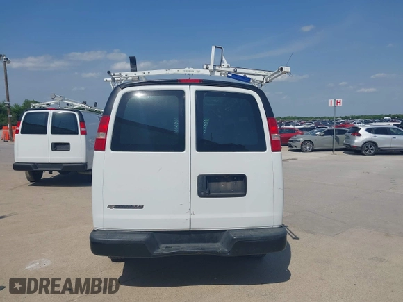 2019 Chevrolet Express Cargo Van with VIN 1GCWGAFPXK1164773, listed as a IAAI auction lot 41984554 with 87,916 mi miles. Bid and sale history available at carsss.com. Image 16.