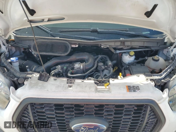 2021 Ford Transit Cargo with VIN 1FTBR3X83MKA58920, listed as a Copart auction lot 59946095 with 65,655 mi miles and Salvage title. Bid and sale history available at DreamBid. Image 12.
