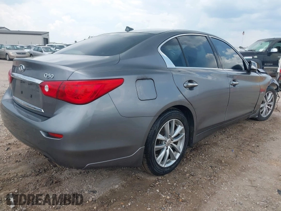 2014 Infiniti Q50 Premium with VIN JN1BV7APXEM681978, listed as a IAAI auction lot 42681718 with 138,857 mi miles and . Bid and sale history available at DreamBid. Image 4.