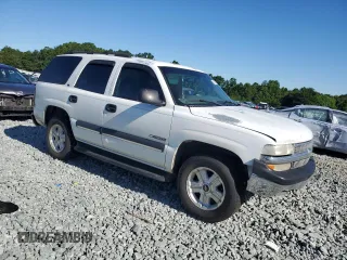 2000 Chevrolet Tahoe LS with VIN 1GNEK13T2YJ203352, listed as a Copart auction lot 58077765 with 314,293 mi miles and Salvage title. Bid and sale history available at DreamBid. Image 4.