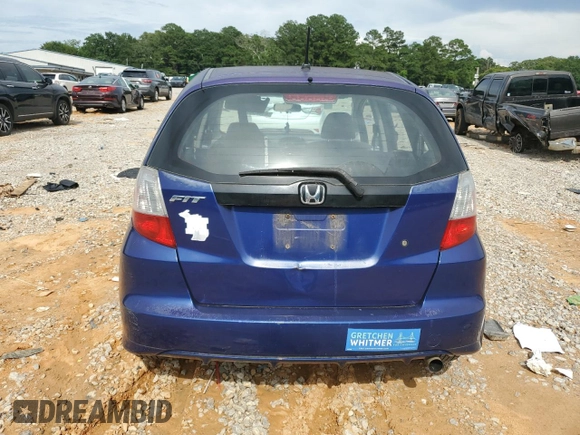 2009 Honda Fit with VIN JHMGE882X9S007865, listed as a Copart auction lot 61025875 with 159,919 mi miles and Clean title. Bid and sale history available at DreamBid. Image 6.