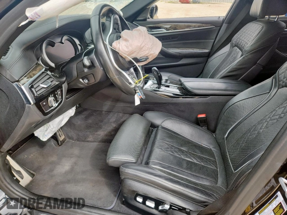 2018 BMW 5 Series 540i xDrive with VIN WBAJE7C52JWD52730, listed as a Copart auction lot 60297425 with 104,208 mi miles and Salvage title. Bid and sale history available at DreamBid. Image 7.
