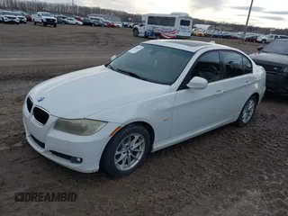 2010 BMW 3 Series 328i with VIN WBAPH7G51ANM52218, listed as a IAAI auction lot 41066937 with 129,932 mi miles and . Bid and sale history available at carsss.com. Image 2.