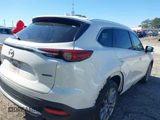 2020 Mazda CX-9 Grand Touring with VIN JM3TCADYXL0415090, listed as a IAAI auction lot 41599205 with 133,080 mi miles. Bid and sale history available at carsss.com. Image 4.