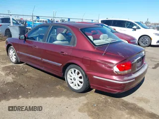 2002 Hyundai Sonata GLS with VIN KMHWF35HX2A586689, listed as a IAAI auction lot 41681385 with 273,132 mi miles. Bid and sale history available at carsss.com. Image 3.