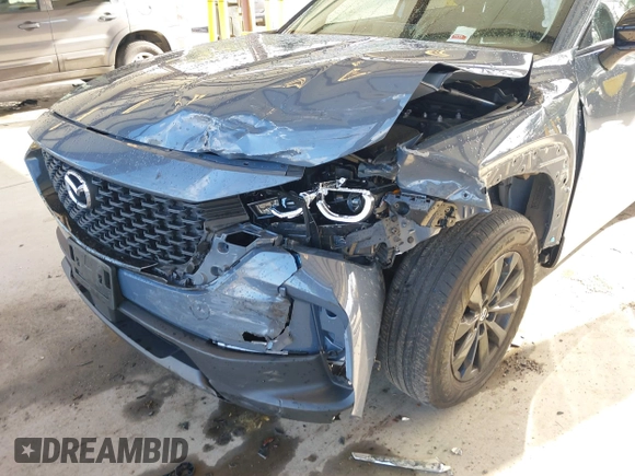 2023 Mazda CX-50 S Select with VIN 7MMVABAM2PN110674, listed as a IAAI auction lot 42014100 with 36,827 mi miles and . Bid and sale history available at DreamBid. Image 6.