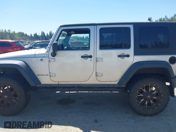 2008 Jeep Wrangler Unlimited X with VIN 1J4GA39148L596727, listed as a IAAI auction lot 42632457 with 175,000 mi miles and . Bid and sale history available at DreamBid. Image 14.