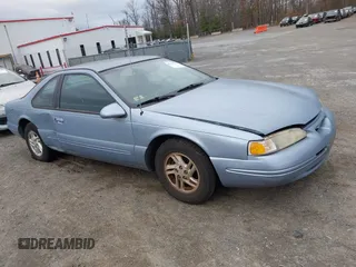 1997 Ford Thunderbird LX with VIN 1FALP62W2VH105702, listed as a IAAI auction lot 41713980 with 90,775 mi miles and . Bid and sale history available at DreamBid. Image 1.