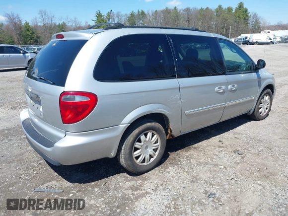 2006 Chrysler Town & Country LWB Touring with VIN 2A4GP54LX6R844499, listed as a IAAI auction lot 42082846 with 133,091 mi miles. Bid and sale history available at carsss.com. Image 4.