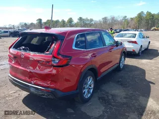 2023 Honda CR-V EX-L with VIN 2HKRS4H75PH406847, listed as a IAAI auction lot 41795117 with 12,879 mi miles. Bid and sale history available at carsss.com. Image 4.