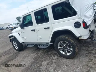 2019 Jeep Wrangler Unlimited Sahara with VIN 1C4HJXEN2KW558851, listed as a IAAI auction lot 42205584 with 175,701 mi miles and . Bid and sale history available at DreamBid. Image 14.