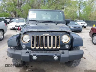 2014 Jeep Wrangler Unlimited Sahara with VIN 1C4BJWEG6EL189712, listed as a IAAI auction lot 42043053 with 108,716 mi miles. Bid and sale history available at carsss.com. Image 12.