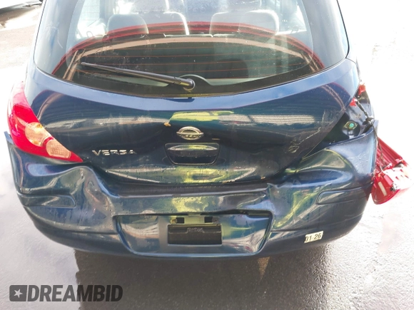 2009 Nissan Versa S z VIN 3N1BC13E19L353170, wystawiony jako IAAI lot #41493381 z przebiegiem 135 765 mil mil oraz . Historia ofert i sprzedaży dostępna na DreamBid. Obrazek 6.