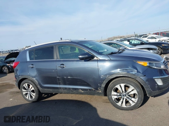 2012 Kia Sportage EX with VIN KNDPCCA22C7325011, listed as a IAAI auction lot 42046727 with 131,475 mi miles and . Bid and sale history available at DreamBid. Image 13.