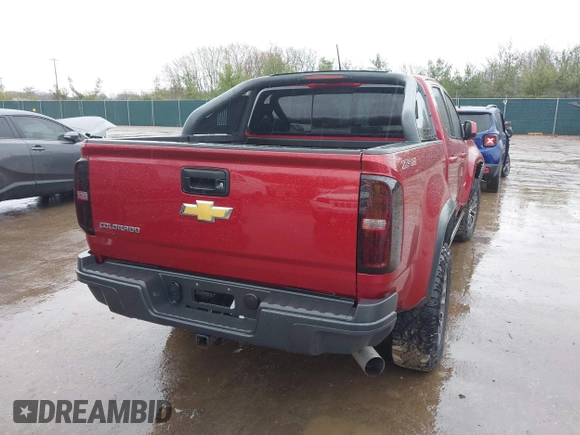 2018 Chevrolet Colorado 4WD ZR2 with VIN 1GCPTEE16J1138755, listed as a IAAI auction lot 41215626 with 118,661 mi miles. Bid and sale history available at carsss.com. Image 4.
