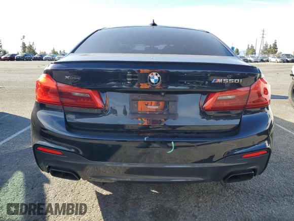 2020 BMW 5 Series M550i xDrive with VIN WBAJS7C06LBN96210, listed as a Copart auction lot 46769365 with 39,710 mi miles and Salvage title. Bid and sale history available at DreamBid. Image 6.