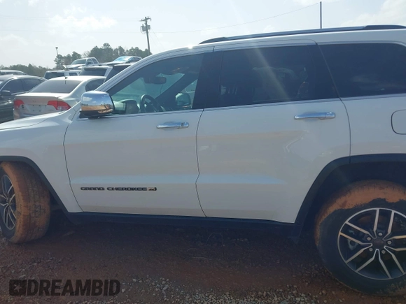 2022 Jeep Grand Cherokee Limited with VIN 1C4RJEBG4NC171643, listed as a IAAI auction lot 41440015 with 52,702 mi miles and . Bid and sale history available at DreamBid. Image 14.
