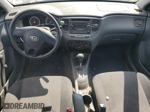 2011 Kia Rio with VIN KNADH4B30B6712241, listed as a Copart auction lot 61301184 with 159,902 mi miles and Salvage Title. Bid and sale history available at DreamBid. Image 8.