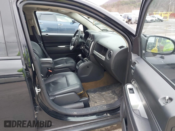 2016 Jeep Compass Latitude with VIN 1C4NJDEB8GD695268, listed as a IAAI auction lot 41724921 with 137,118 mi miles. Bid and sale history available at carsss.com. Image 5.