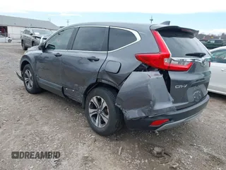 2017 Honda CR-V LX with VIN 2HKRW6H39HH210702, listed as a IAAI auction lot 41859435 with 126,532 mi miles. Bid and sale history available at carsss.com. Image 3.