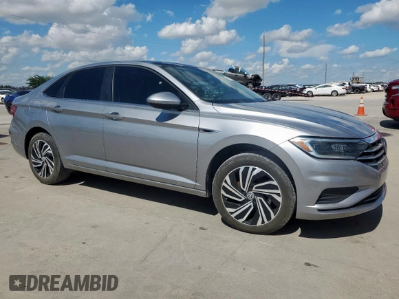 2021 Volkswagen Jetta SEL with VIN 3VWE57BUXMM088877, listed as a Copart auction lot 62319195 with 31,604 mi miles and Salvage title. Bid and sale history available at DreamBid. Image 4.