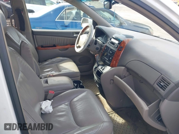 2008 Toyota Sienna XLE with VIN 5TDBK22C28S012097, listed as a IAAI auction lot 41758136 with 203,888 mi miles and . Bid and sale history available at DreamBid. Image 5.