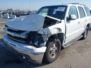 2002 Chevrolet Tahoe LS z VIN 1GNEC13TX2R240719, wystawiony jako IAAI lot #41616356 z przebiegiem 235 081 mil mil oraz . Historia ofert i sprzedaży dostępna na DreamBid. Obrazek 6.