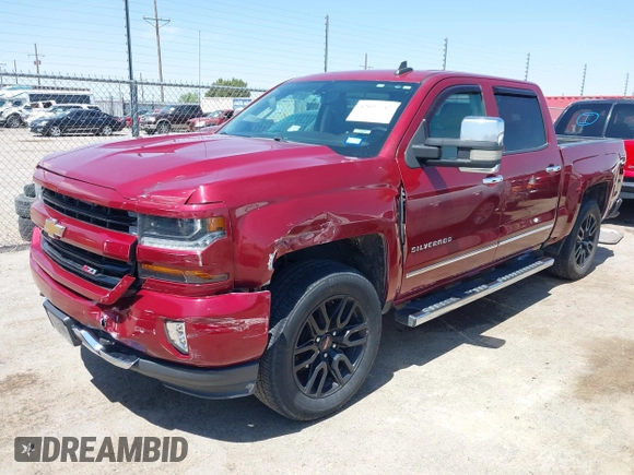 2017 Chevrolet Silverado 1500 LT with VIN 3GCUKREC4HG164281, listed as a IAAI auction lot 42037712 with 133,935 mi miles and . Bid and sale history available at DreamBid. Image 2.