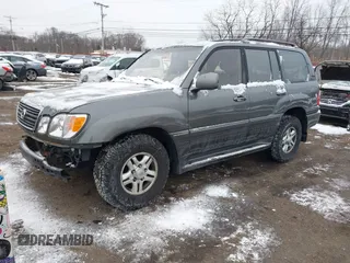 2000 Lexus LX 470 with VIN JT6HT00W9Y0096647, listed as a IAAI auction lot 41376347 with 231,916 mi miles and . Bid and sale history available at DreamBid. Image 2.