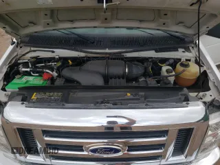 2014 Ford Econoline Passenger XL with VIN 1FBNE3BL0EDA92960, listed as a Copart auction lot 68583924 with 73,153 mi miles and Salvage Title. Bid and sale history available at carsss.com. Image 12.