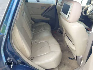 2009 Nissan Murano S with VIN JN8AZ18WX9W160247, listed as a IAAI auction lot 42142907 with 186,702 mi miles and . Bid and sale history available at carsss.com. Image 8.