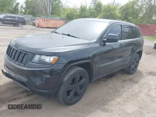 2015 Jeep Grand Cherokee Altitude z VIN 1C4RJFAG5FC682058, wystawiony jako IAAI lot #42352814 z przebiegiem 228 067 mil mil oraz . Historia ofert i sprzedaży dostępna na DreamBid. Obrazek 17.