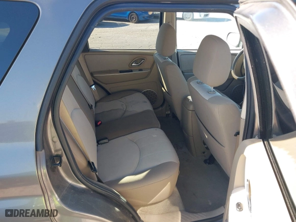 2006 Mercury Mariner Luxury with VIN 4M2YU56156KJ11686, listed as a IAAI auction lot 41854750 with 145,048 mi miles. Bid and sale history available at carsss.com. Image 8.