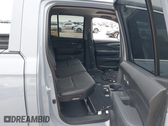 2023 Honda Ridgeline RTL with VIN 5FPYK3F58PB047099, listed as a IAAI auction lot 42313390 with Not provided miles and . Bid and sale history available at DreamBid. Image 8.