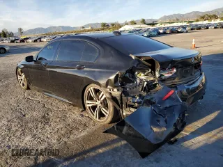 2017 BMW 7 Series 740i with VIN WBA7E2C38HG741255, listed as a Copart auction lot 39926213 with 76,321 mi miles. Bid and sale history available at carsss.com. Image 2.