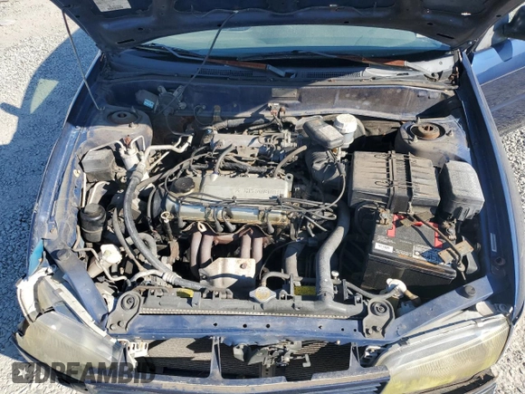 1999 Mitsubishi Mirage DE with VIN JA3AY26AXXU050527, listed as a Copart auction lot 74435914 with 101,224 mi miles and Salvage title. Bid and sale history available at DreamBid. Image 11.