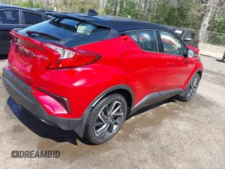 2021 Toyota C-HR LE with VIN NMTKHMBX9MR134669, listed as a IAAI auction lot 41982475 with 11,572 mi miles. Bid and sale history available at carsss.com. Image 4.