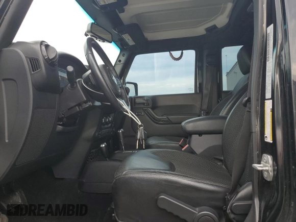 2016 Jeep Wrangler Unlimited Sahara with VIN 1C4BJWEG2GL178922, listed as a Copart auction lot 63296855 with 114,106 mi miles and Clean title. Bid and sale history available at DreamBid. Image 7.
