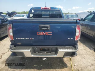 2020 GMC Canyon 4WD SLE with VIN 1GTG6CEN6L1154424, listed as a Copart auction lot 62439064 with 86,739 mi miles and Salvage Title. Bid and sale history available at carsss.com. Image 6.