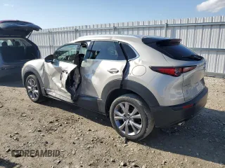 2023 Mazda CX-30 S Premium with VIN 3MVDMBDM6PM525178, listed as a Copart auction lot 54330005 with 21,670 mi miles and Salvage title. Bid and sale history available at DreamBid. Image 2.