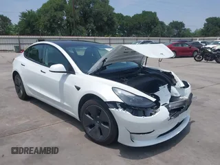 2023 Tesla Model 3 z VIN 5YJ3E1EA3PF604076, wystawiony jako IAAI lot #42181964 z przebiegiem 23 207 mil mil oraz . Historia ofert i sprzedaży dostępna na DreamBid. Obrazek 1.