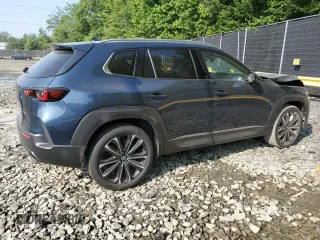 2023 Mazda CX-50 S Premium Plus with VIN 7MMVABEM0PN117875, listed as a Copart auction lot 59443705 with 40,946 mi miles and Salvage title. Bid and sale history available at DreamBid. Image 3.