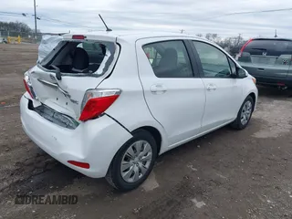 2014 Toyota Yaris L with VIN JTDKTUD34ED589582, listed as a IAAI auction lot 41538884 with 87,798 mi miles. Bid and sale history available at carsss.com. Image 4.