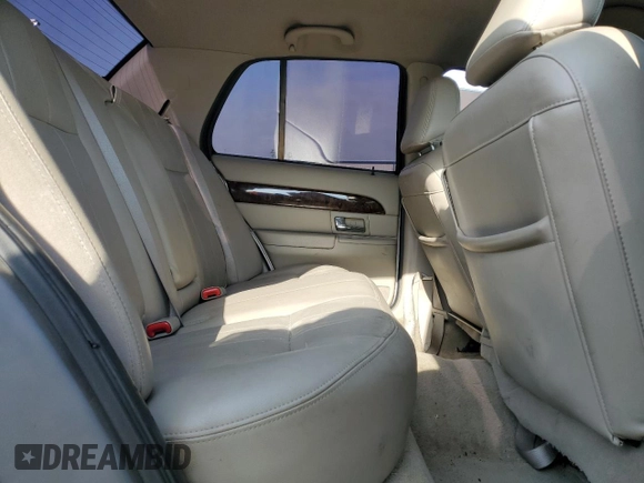 2010 Mercury Grand Marquis LS z VIN 2MEBM7FV4AX636897, wystawiony jako Copart lot #53387985 z przebiegiem Nie podano mil oraz Szkody całkowita. Historia ofert i sprzedaży dostępna na DreamBid. Obrazek 10.