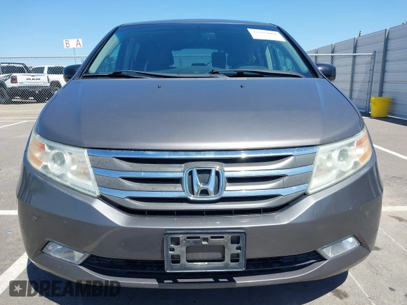 2012 Honda Odyssey Touring with VIN 5FNRL5H98CB011297, listed as a IAAI auction lot 42207061 with 154,073 mi miles and . Bid and sale history available at DreamBid. Image 12.