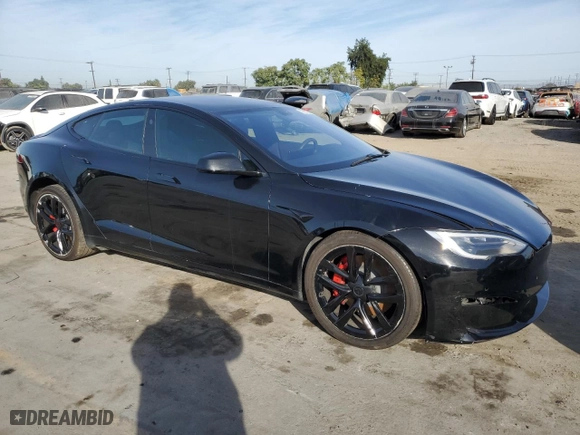 2021 Tesla Model S Plaid with VIN 5YJSA1E69MF438211, listed as a Copart auction lot 79697604 with 58,350 mi miles and Salvage Title. Bid and sale history available at carsss.com. Image 4.