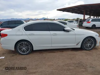 2018 BMW 5 Series 530e xDrive with VIN WBAJB1C55JB374652, listed as a IAAI auction lot 41812287 with 84,593 mi miles and . Bid and sale history available at carsss.com. Image 12.