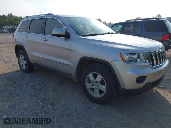 2011 Jeep Grand Cherokee Laredo with VIN 1J4RR4GG2BC514497, listed as a IAAI auction lot 42688206 with 88,822 mi miles and . Bid and sale history available at DreamBid. Image 1.