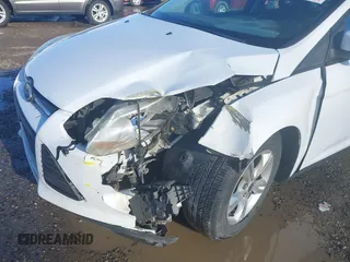2014 Ford Focus SE with VIN 1FADP3F23EL129661, listed as a IAAI auction lot 41676155 with 183,733 mi miles. Bid and sale history available at carsss.com. Image 6.
