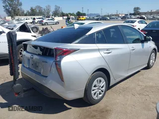 2018 Toyota Prius Two with VIN JTDKBRFU6J3068322, listed as a IAAI auction lot 42001483 with 57,597 mi miles. Bid and sale history available at carsss.com. Image 4.